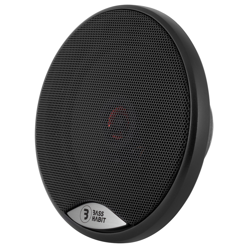 En rund, svart högtalare med metallnät och logotyp.