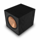 Yamaha RX-V6A & Klipsch Reference R-600F 5.1 hemmabiopaket, svart En svart subwoofer med en kopparfärgad högtalare.