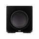 Magnat Signature 607 5.1 högtalarpaket, svart Svart subwoofer med rund högtalare i mitten och stilren design.