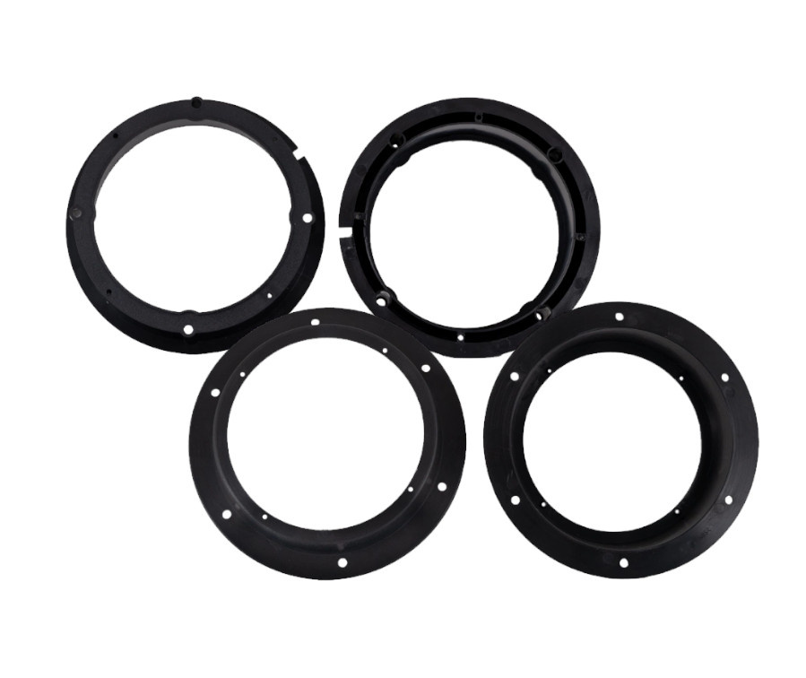 Adapterpaket för högtalarbyte, fyra svarta ringar.