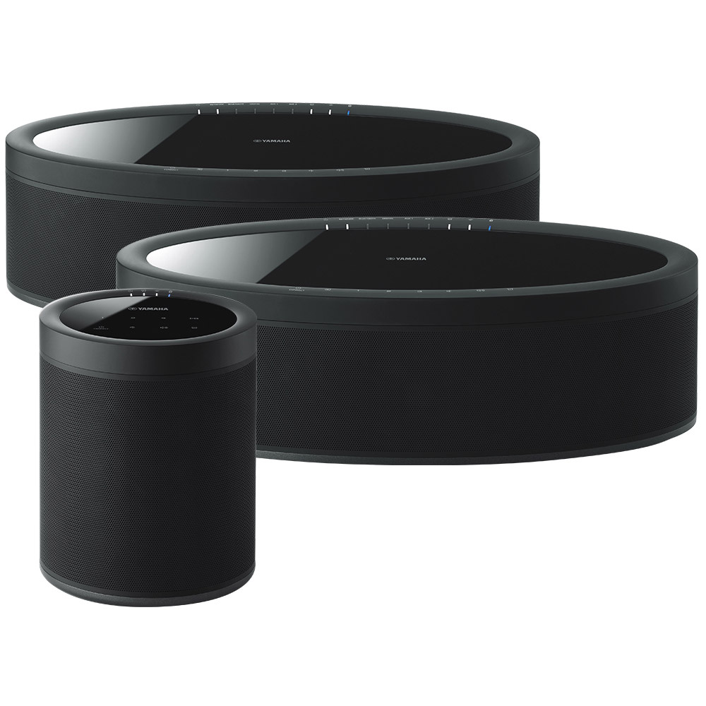 Högtalare i svart, ett par med avrundad design, trådlösa funktioner.